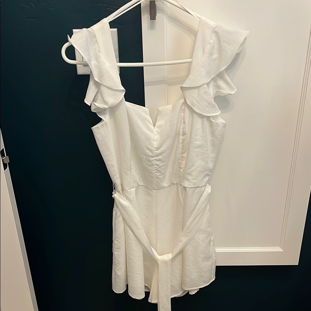 Francesca’s white sleeveless romper